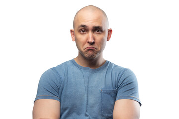 Wall Mural - Photo of young bald sad man in blue tee shirt