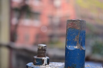 Sticker - Closeup shot of a nut and bolt of a water pumping station