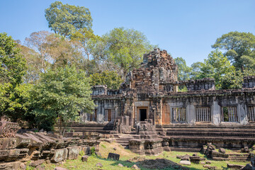 Wall Mural - Ancient Preah Palilay temple in Angkor Thom and huge Banyan trees, Angkor, Cambodia.