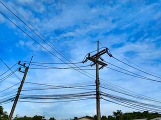 electric pole with blue sky background