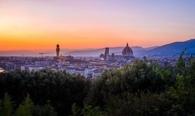 Canvas Print - Aerial shot of the Cathedral of Santa Maria del Fiore and the buildings in Florence during sunset