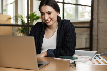 Confident attractive young woman entrepreneur