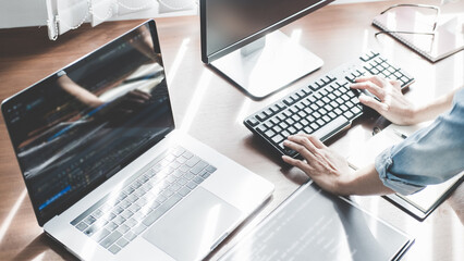 Wall Mural - programmer working in a software development and coding technologies. website design. technology con