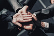 © yurolaitsalbert - close up. young business people joining their palms together.