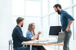 © yurolaitsalbert - Agency staff talking to the client in the office.