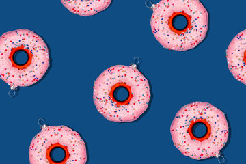 Wall Mural - Pattern with Christmas tree toy donut on classic blue. Holiday season concept, place for text