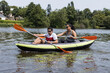 © Fabian - MAN AND WOMAN KAYAKING IN RIVER