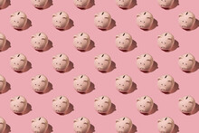 Flat Lay Abstract Pattern With Ceramic Pink Piggy Bank On Pink Background. Top View. Finance Or Banking Concept.
