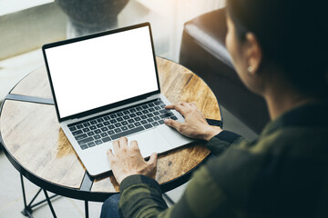 computer mockup image blank screen.hand woman work using laptop with white background for advertising,contact business search information on desk at coffee shop.marketing and creative design