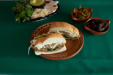 Cemita with milanesa. Cemita is a traditional sandwich from the Mexican state of Puebla.