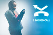 Missed call logo. Caption 1 missed call on a blue background. Concept - girl did not have time to pick up the phone. African american is looking at the phone. Concept - voicemail alert.
