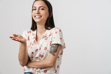 Wall Mural - Photo of funny beautiful woman laughing and looking at camera