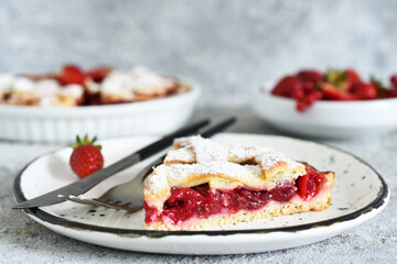 Wall Mural - Cake with cherries and icing sugar on a concrete background. Sliced Cherry Pie.