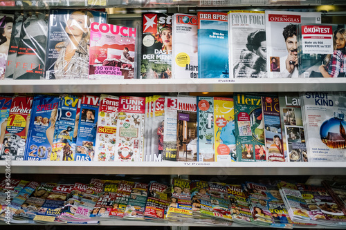 Full Frame Shot Of Magazines On Shelves In Store