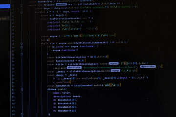 Program code CSS on black background. Computer screen close up. IT or freelance programmer concept. Software develop script on display. Computer Science