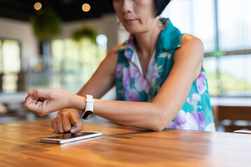 Sticker - woman using smartphone with smart watch