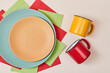 Festive dinner or Childrens party. Table setting background. Celebration concept. Top view of plate, napkins and cups
