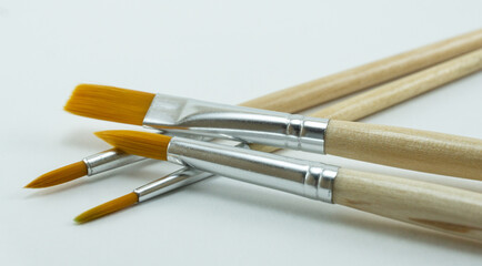 Paint brushes on a white background