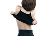 © marchsirawit - woman taking off her black shirt, back view. White background.
