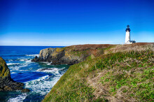 Lighthouse On Spur Of Land At Yaquina Head