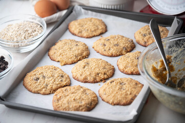 Canvas Print - chocolate chip oatmeal cookie on iron pan