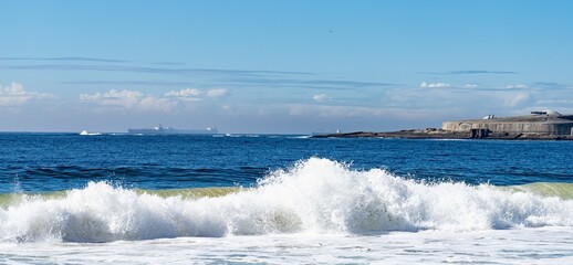 Big waves of the sea on a sunny day in Brazil