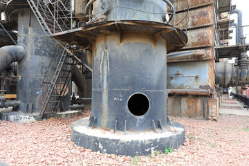 Unused and abandoned metal pipes in factories