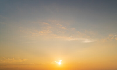 Wall Mural - abstract amazing scene of stuning colorful sunset with moving clouds background in nature and travel