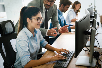 Wall Mural - group of business people working together, brainstorming in office
