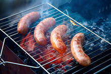 Bar-b-q Grilled Sausages Fried Sausages. Homemade Sausages From Turkey (chicken) Fried Isolated On White Background. Meat Product. Catering.