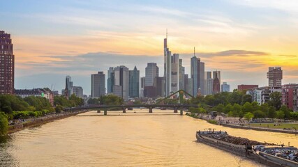 Fototapete - Frankfurt am Main, Germany. Day to night time lapse video with river and skyscrapers
