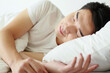 © ImageHit - Man sleeping on bed