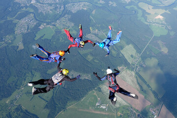 Poster - Skydiving. Skydivers are training and flying in the sky.