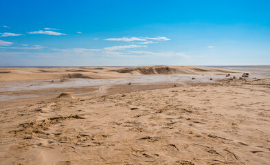 Wall Mural - salt marsh in the Sahara desert between sand dunes