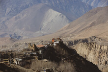 Small Village On Top Of A Hill Near Muktinath Temple At Mustang. Sunny Day And Mountains On The Background.