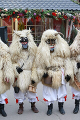 Wall Mural - Moscow Maslenitsa Festival 2020. Traditional national celebration in folk style. Slavic tradition. Performance with Hungarian masked artists. Buso from Hungary. Busojaras holiday in Moscow. Beast