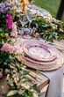 An elegant wedding table setting in the garden.