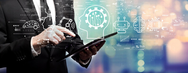 Wall Mural - future technology concept with businessman using his tablet computer