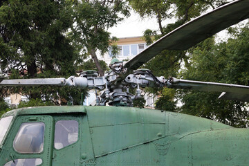 propeller of an old helicopter closeup on nature background.