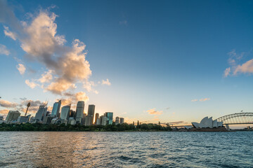 Fototapete - Sydney downtown skyline during sunset at Sydney harbor bay, NSW, Australia