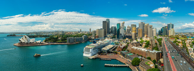 Fototapete - Panorama view of Sydney harbor bay and Sydney downtown skyline with opera house in a beautiful afternoon, Sydney, Australia.