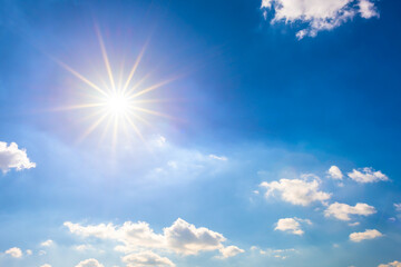 summer background, wonderful blue sky with bright sun and clouds
