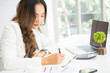© Somsak - Portrait of a happy casual businesswoman,Successful business woman working at the office