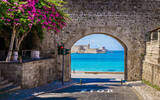 Fototapeta  - Landscape with Virgin Mary's Gate of Rodos Old Town, Rhodoes