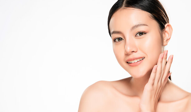 close up Beautiful Young asian Woman touching her clean face with fresh Healthy Skin, isolated on white background, Beauty Cosmetics and Facial treatment Concept