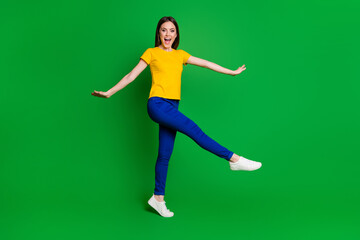 Canvas Print - Full length body size view portrait of her she nice-looking attractive lovely cheerful cheery careless funky girl jumping going having fun isolated bright vivid shine vibrant green color background