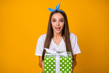 Sticker - Portrait astonished lovely cute sweet girl hold big green dotted present box she get on 14-february celebration impressed scream wow omg wear good look outfit isolated bright color background