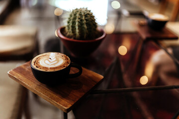 Wall Mural - cup of coffee on table in cafe, vintage style copy space