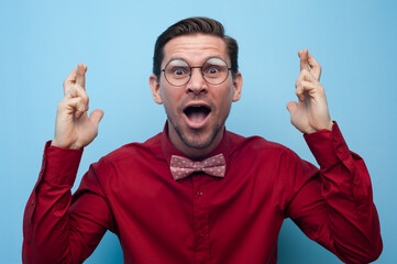 Wall Mural - Portrait of a happy young man with glasses