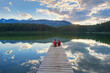 © romylee - father and son enjoying the sunset in Banff National park